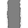 A ragged vertical hole in paper sheet. Main background is white, and the resulting window is dark gray. Edges of the hole have Royalty Free Stock Photo