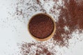 Ragi grains in rustic wooden bowl