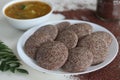 Ragi Idli served with sambhar. A nutritious South Indian staple made with fermented batter of unpolished finger millet and