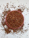 Ragi/Nachni also known as finger millet, which is a healthy food and is gluten-free. Ragi in a Pink Plastic Bowl in a