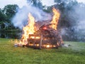 Raging Bonfire. Pile of burning pallets