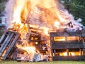 Raging Bonfire. Pile of burning pallets