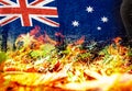 Raging and dangerous forest fire and Australian flag - digital composite.