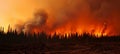 Raging inferno massive wildfire tearing through british columbia, canada with towering flames