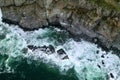 raging ocean waters waters ocean rocks sky and wave