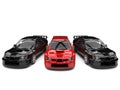 Raging red GT race car in between black race cars