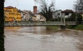 Raging river during flooding with risk of overflow in Northern Italy