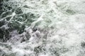 Raging river with a lot of white  foam Royalty Free Stock Photo