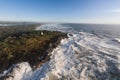 Raging storm waves smashing into rocks