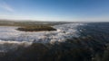 Raging storm waves smashing into rocks