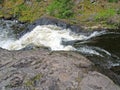 The raging stream on the Suna River. Karelia, Kivach falls