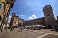 Ragione palace and square in front of it with tables of restaurant full of people