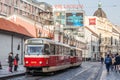 rague tram, or called Prazske tramvaje, Tatra T3 model, near the Palladium Mall, crowded with commuters.