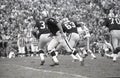 Raiders QB Daryle Lamonica hands off to Hewritt Dixon #35