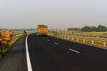 15.11.2022. Raiganj, West Bengal, India. Black asphalt well marked newly constructed national highway road in Raiganj