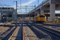 The rail diesel trains are running parallel to the tracks. In Thailand