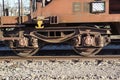 Rail freight car close-up .Wheel pair from a freight car on rails. Royalty Free Stock Photo