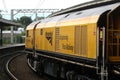 Rail grinding train passing through Carnforth Royalty Free Stock Photo