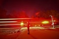 Rail signal long exposure as freight train passes by at full speed Royalty Free Stock Photo