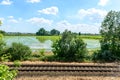 Rail tracks and rice fields, Lomellina (Italy) Royalty Free Stock Photo