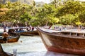 Railay, Krabi Province, Thailand - February 17, 2019: Long-tailed boats on the shores of a tropical island. Taxi boats are Royalty Free Stock Photo