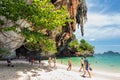 Railay, Thailand: travelers swim and walk at Phra Nang Phranang Beach of Railay Peninsula