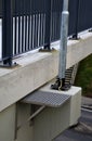 railing at the bridge with vertical fence bars anchored to the Royalty Free Stock Photo