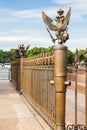 Railing with double-headed eagles around the Alexander Column on Palace Square in St. Petersburg Royalty Free Stock Photo