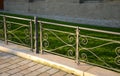 railing historical park black iron cast metal low paving lawn grass green beige Royalty Free Stock Photo