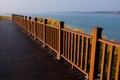 Railings on the lakeside plank road Royalty Free Stock Photo