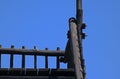 RAILINGS AND POSTS AGAINST A BLUE SKY ABSTRACT Royalty Free Stock Photo