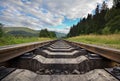 Railroad Against Mountains And Beautiful Sky, Near Forest Royalty Free Stock Photo