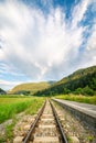 Storm cloud over a railroad Royalty Free Stock Photo