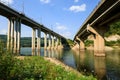 Railroad and automobile trestle bridges over Tsonevo dam, at Luda Kamchia river in Bulgaria against blue sky with clouds. Transpor Royalty Free Stock Photo