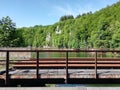 Railroad bridge over a lake Royalty Free Stock Photo