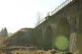 Railroad bridge in Ukrainian Carpathian mountains in sunny day Royalty Free Stock Photo