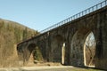 Railroad bridge in Ukrainian Carpathian mountains in sunny day Royalty Free Stock Photo