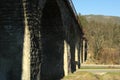 Railroad bridge in Ukrainian Carpathian mountains in sunny day Royalty Free Stock Photo