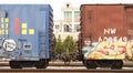 Railroad cars with colorful graffiti