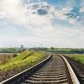 Railroad close-up to horizon and dramatic sky in sunset