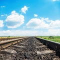 Railroad closeup to horizon and blue sky
