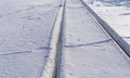 Railroad covered with snow at winter day