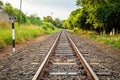 Railroad crossing and blue sky. Perspective line view