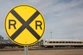 Railroad Crossing Sign and Railcar Royalty Free Stock Photo