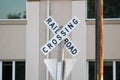 Railroad Crossing Sign in a street Royalty Free Stock Photo