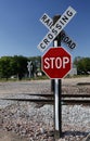 Railroad Crossing Stop Sign at Tracks Royalty Free Stock Photo