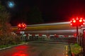 Railroad crossing during a winter afternoon in a city in England, January 2022 Royalty Free Stock Photo