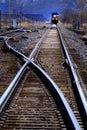 Railroad line tracks with locomotive engine