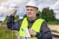 Railroad maitenence worker with rope near railway Royalty Free Stock Photo