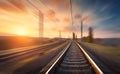 Railroad in motion at sunset. Blurred railway station Royalty Free Stock Photo